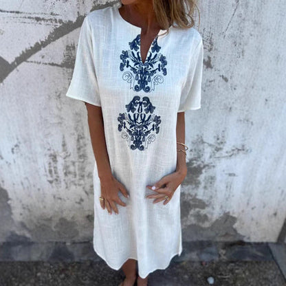 Damklänning midi – Avslappnad passform – Broderad fram – Naturliga fibrer – Kort ärm