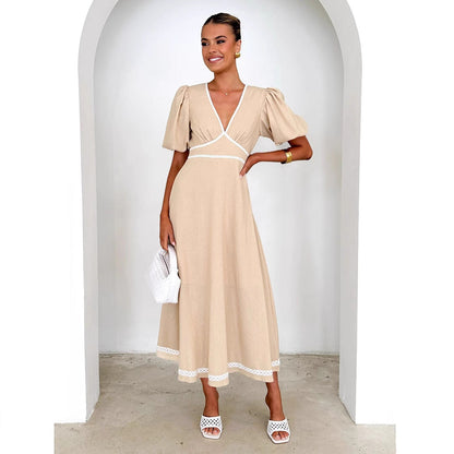 Damklänning – Hellång – V-ringning – Puffärm – Spetsdetaljer – Markerad midja