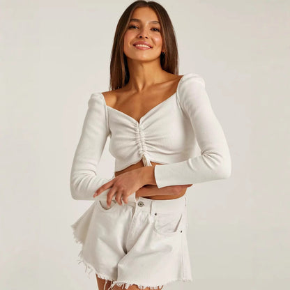 Damtop – Slim Fit – Kort Modell – Knytning Fram – V-Ringning – Ribbad Stickning – Lång Ärm