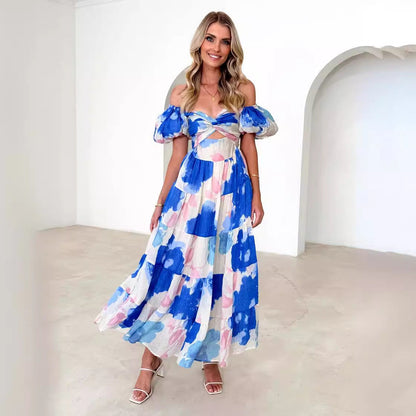 Damklänning maxi – Fit and flare – Puffärm – Utskuren livdel – Volangkjol – Mönstrad