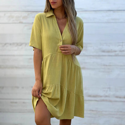 Damklänning – Swingmodell – Kort ärm – Knälång – Naturliga fibrer – Knäppning fram