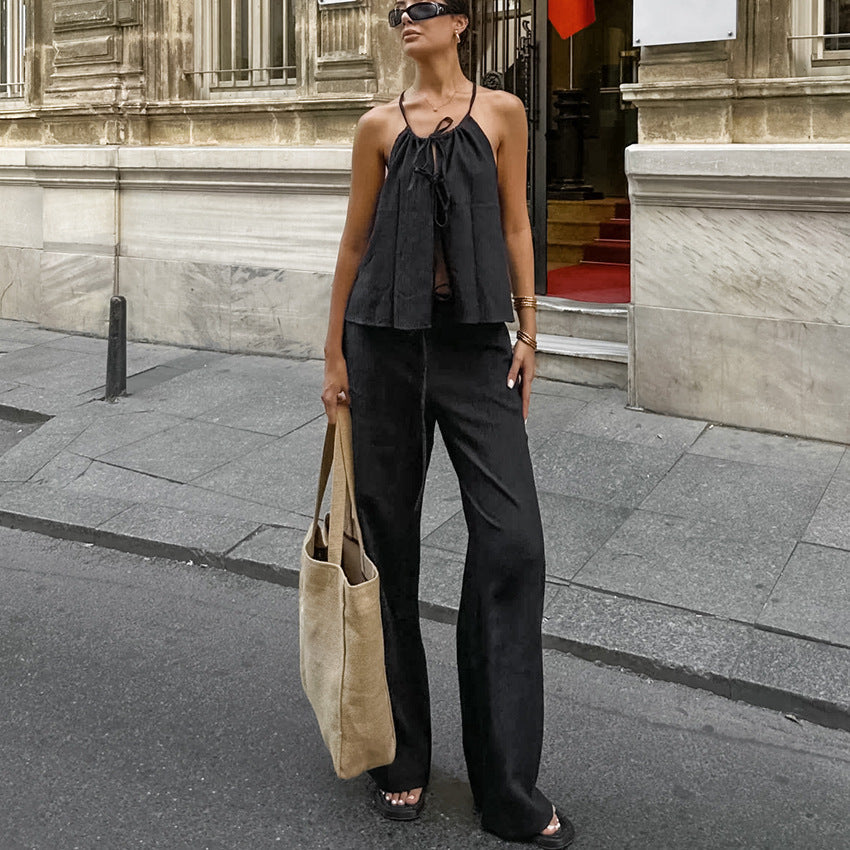 Damset med linnemix – Ärmös crop top med knytning – Vida byxor med hög midja