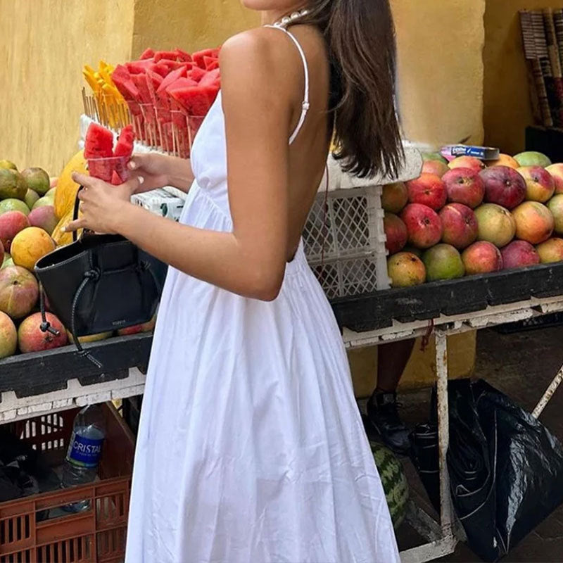 Damklänning maxi – V-ringning – Spagettiband – Öppen rygg – Luftig passform