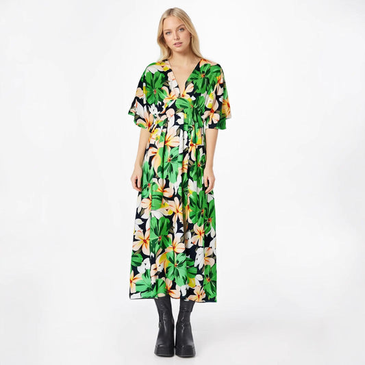 Damklänning – Hög midja – Lös passform – V-ringning – Korta vida ärmar – Hellång med slits