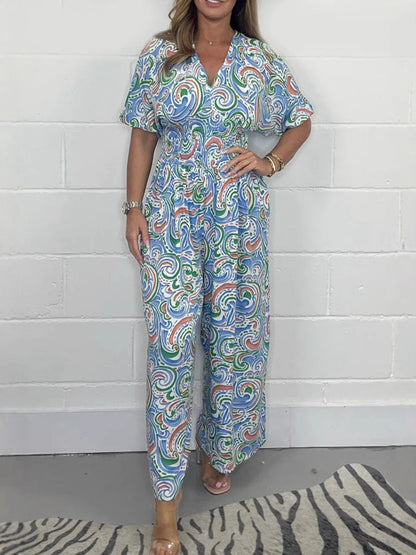 Dam jumpsuit – Avslappnad passform – Vida ben – V-ringning – Boho-mönster – Naturfibrer