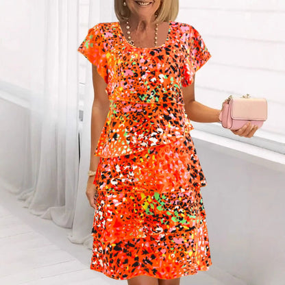 Damklänning midi – Blommigt mönster – Volangskärning – Avslappnad passform – Luftigt tyg