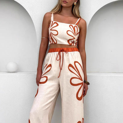 Damset i vida byxor – Lätt bomullsblandning – Avslappnad passform – Blommigt mönster