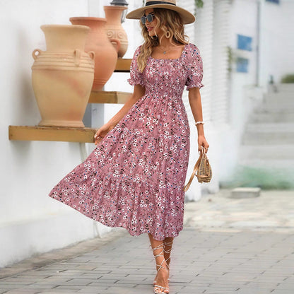 Damklänning midi – empireliv – puffärm – blommigt mönster – bomullsblandning – fyrkantsringning