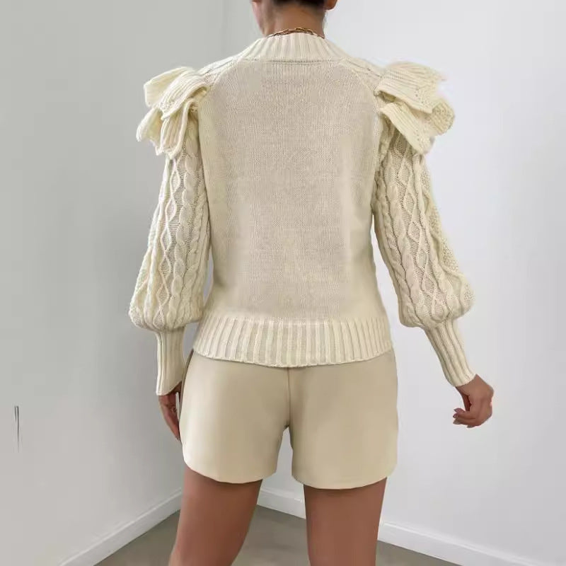 Damtröja – Kort Modell – Kabelstickad – Voluminösa Axelvolanger – Långärmad