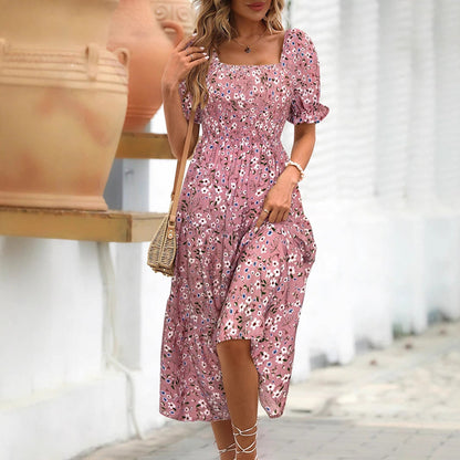 Damklänning midi – empireliv – puffärm – blommigt mönster – bomullsblandning – fyrkantsringning