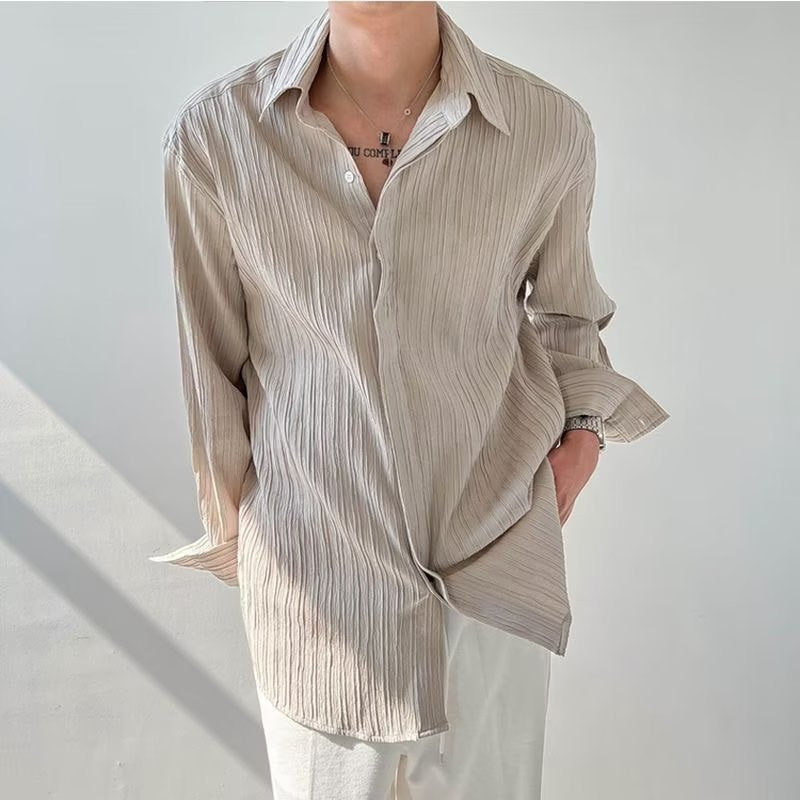 Unisex långärmad skjorta – krinklad struktur – oversized passform – avslappnad stil