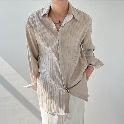 Unisex långärmad skjorta – krinklad struktur – oversized passform – avslappnad stil
