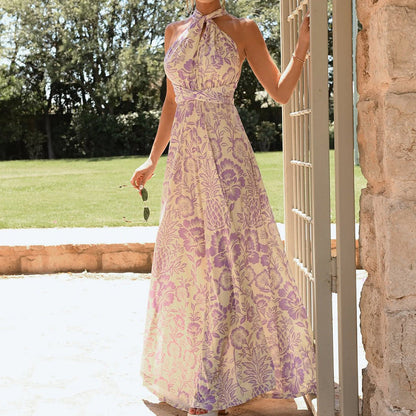 Damklänning halterneck – Blommigt tryck – Ärmös – Ankelängd – Öppen rygg