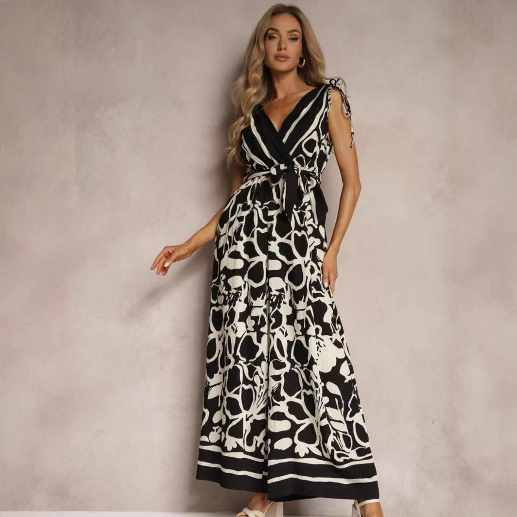 Damjumpoverall – V-ringning ärmlös – Avslappnad passform – Knytmidja – Print hel längd