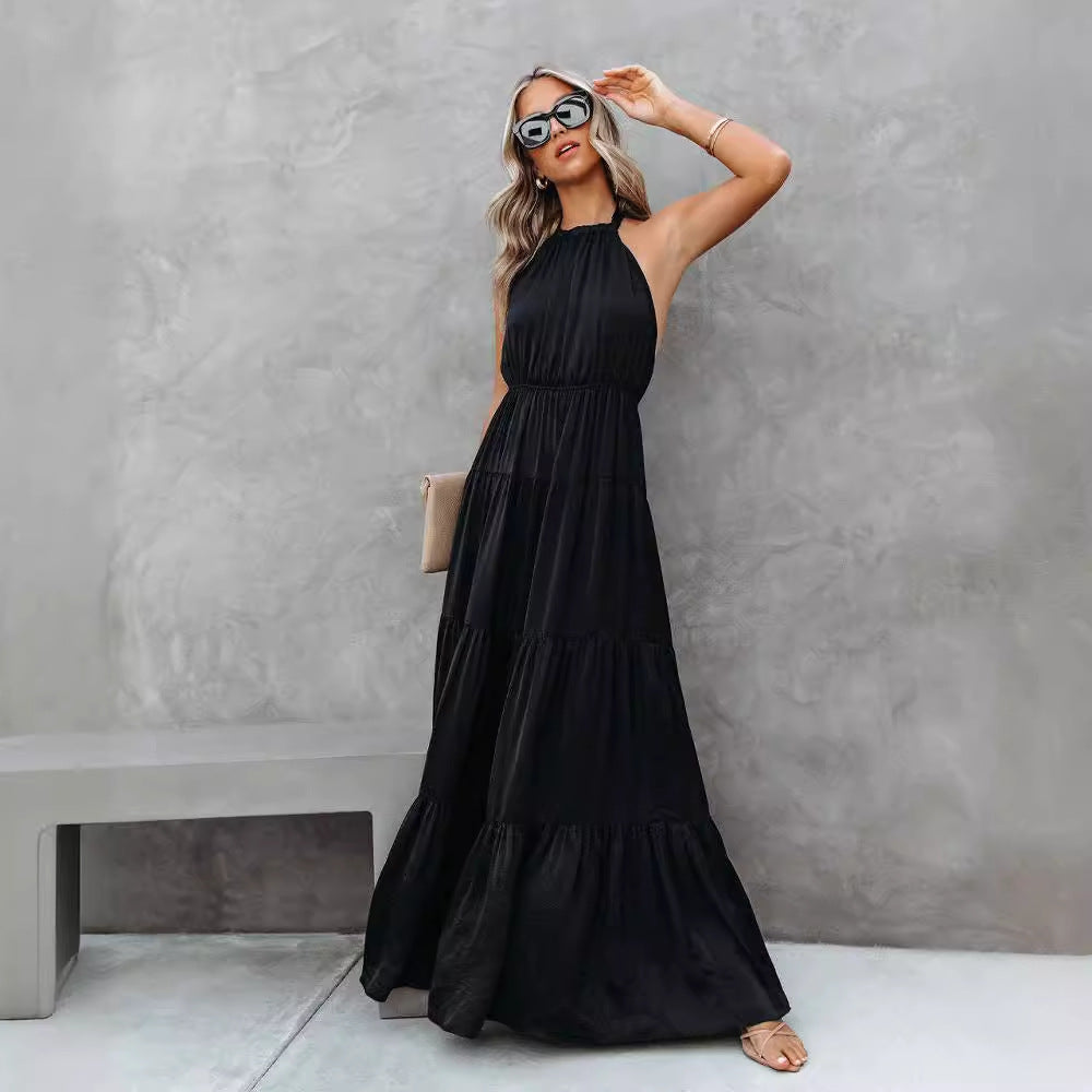 Damklänning halterneck – Lätt och luftig – Markerad midja – Maxilängd volangkjol