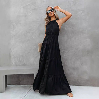 Damklänning halterneck – Lätt och luftig – Markerad midja – Maxilängd volangkjol