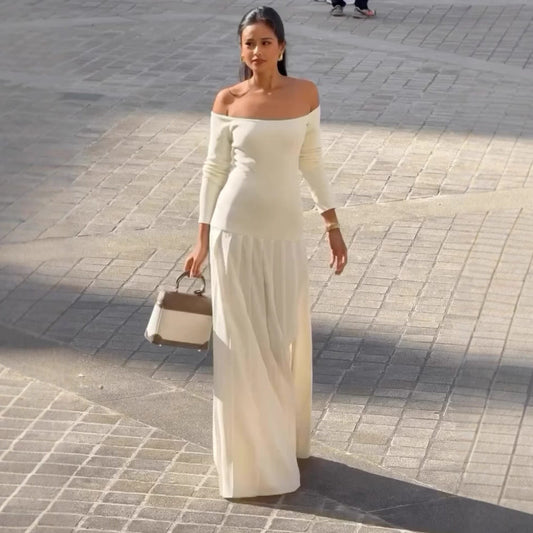 Damklänning off shoulder – figurnära överdel – lång ärm – plisserad maxikjol