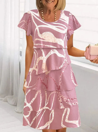 Damklänning midi – Blommigt mönster – Volangskärning – Avslappnad passform – Luftigt tyg