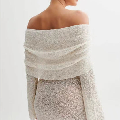 Damklänning strand – figurnära passform – off shoulder – stickad – lång ärm – semi-transparent