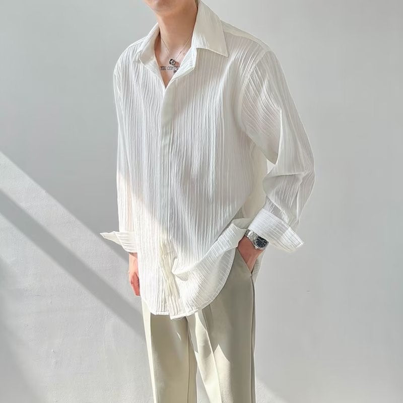 Unisex långärmad skjorta – krinklad struktur – oversized passform – avslappnad stil