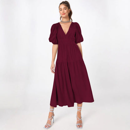 Damklänning midi – Djup V-ringning – Puffärmar – Figursydd midja – Volangkjol