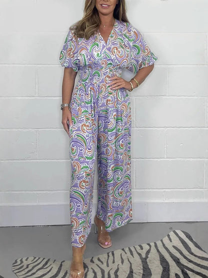 Dam jumpsuit – Avslappnad passform – Vida ben – V-ringning – Boho-mönster – Naturfibrer