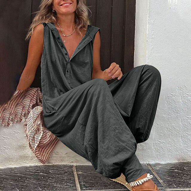 Dam jumpsuit – Avslappnad passform – Vida ben – Ärmlös – V-ringning – Naturmaterial