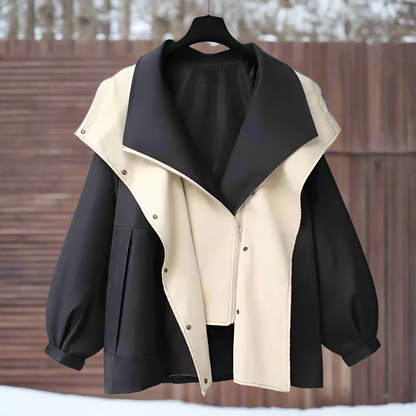 Damjacka – Stor passform – Dold knappstängning – Justerbara ärmar – Stora fickor