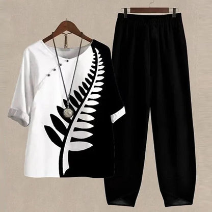 Damset – Avslappnad Passform – Andningsbar Mix – Topp med Fjärilstryck & Vida Byxor