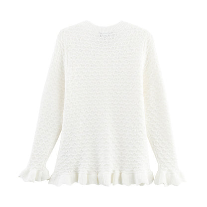 Damtröja med rund hals – Knappar framtill – Volangkant – Hålstickning – Långärmad