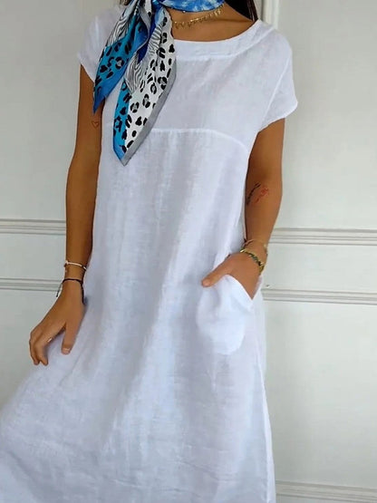 Damklänning midi – avslappnad passform – kort ärm – rund hals – andningsbart tyg