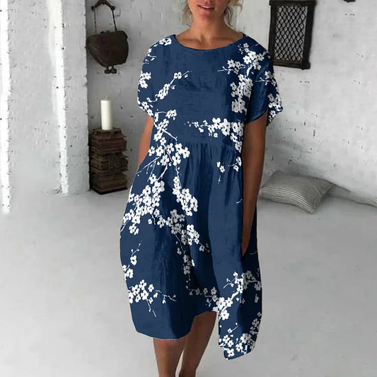 Damklänning midi – avslappnad passform – kort ärm – blommigt tryck – andningsbart tyg