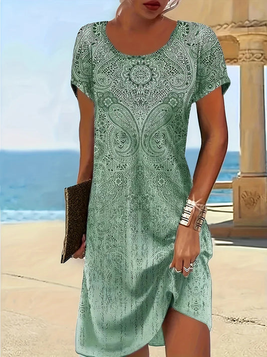 Damklänning midi – Avslappnad passform – Andningsbart tyg – Kort ärm – Mönstrad design