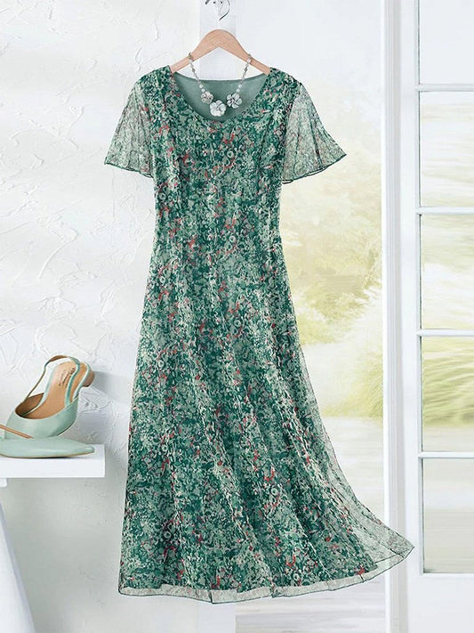 Dam Maxiklänning – Boho Stil – Blommigt Mönster – Kort Ärms – Luftigt Tyg