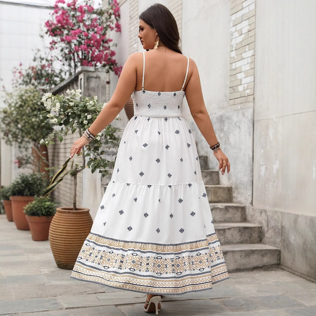 Damklänning maxi – ärmlös V-ringning – figursmickrande passform – geometriskt mönster