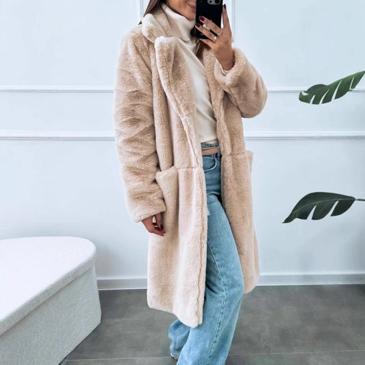Dam lång kappa – Oversized passform – Mjuk textur – Vida slag – Framfickor