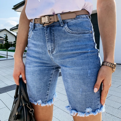 Damshorts i denim – Normal passform – Mellanhög midja – Fransig och sliten look