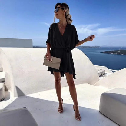 Damklänning omlott – Djup V-ringning – Avslappnad passform – Lätt och luftig