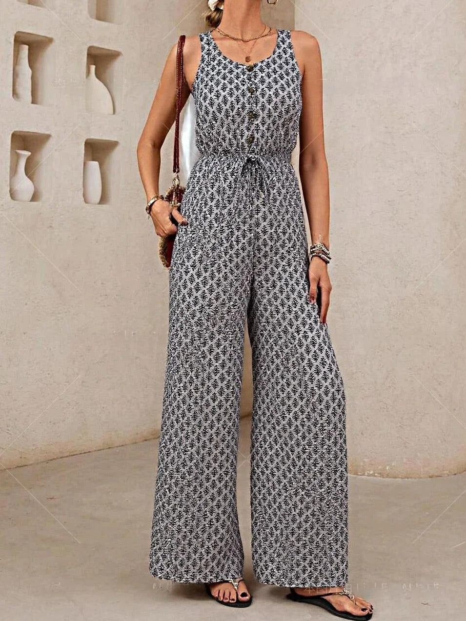 Damjump­suit – Avslappnad Passform – V-ringning – Ärmlös – Dragsko­midja – Vida Ben