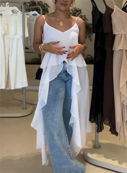 Damklänning – V-ringning – Spagettiband – Volanglager – Asymmetrisk fåll – Lös passform