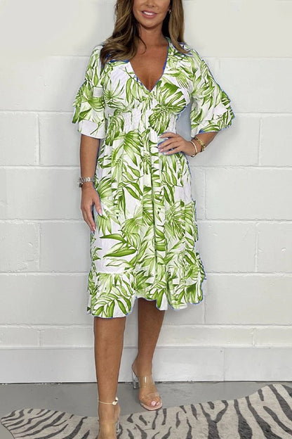 Damklänning midi – Lös passform – Hög midja – V-ringning – Blommig – Volangärm – Bomullskänsla