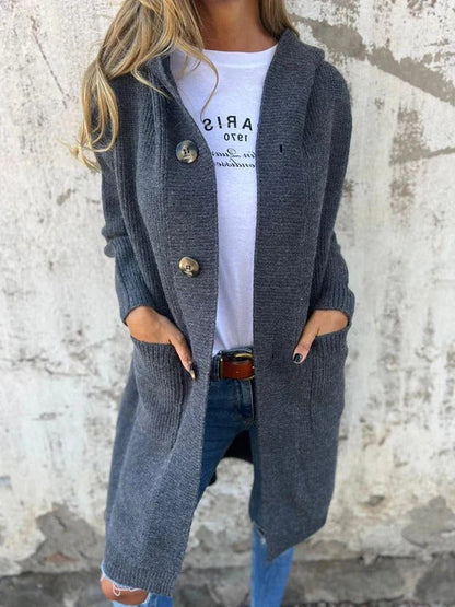 Damkofta lång – Avslappnad passform – Ullstickad – Knälång – Knappstängning – Fickor