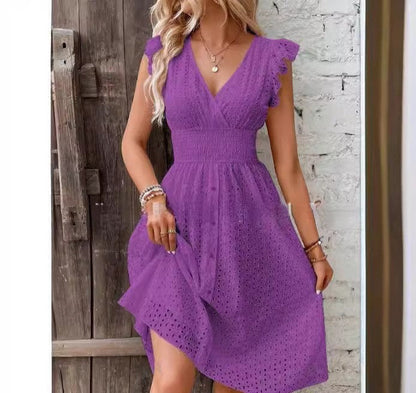 Damklänning midi – A-linjeformad – Broderie anglaise – Omlottliv – Resårmidja