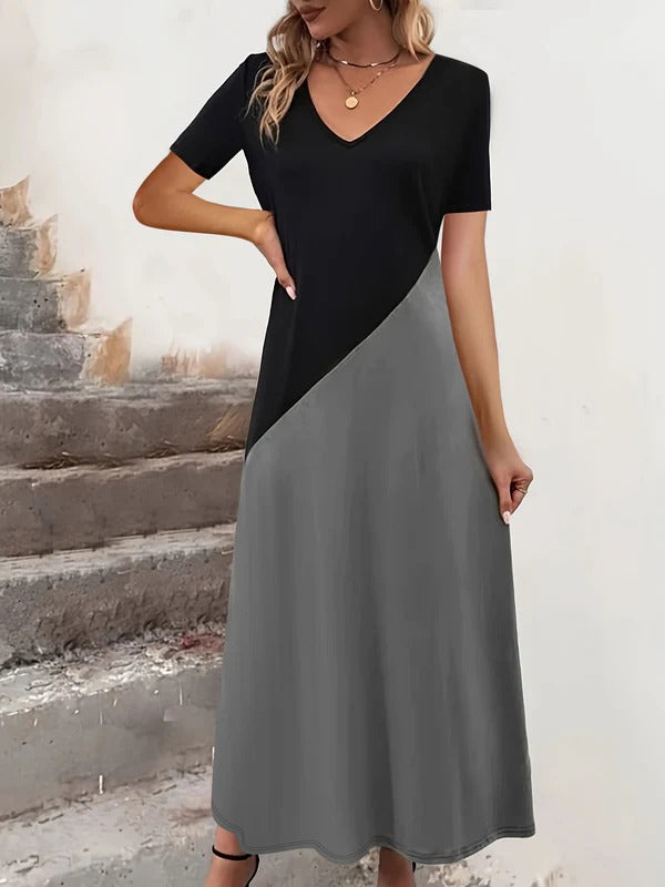 Damklänning maxi – figursydd överdel – v-ringning – kort ärm – färgblockdesign