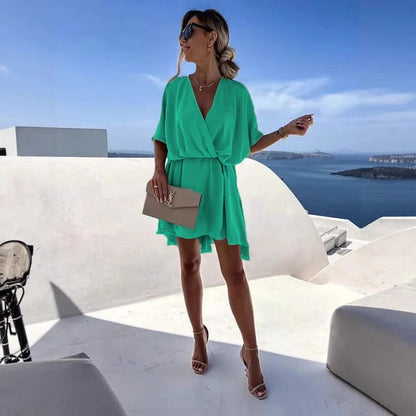 Damklänning omlott – Djup V-ringning – Avslappnad passform – Lätt och luftig