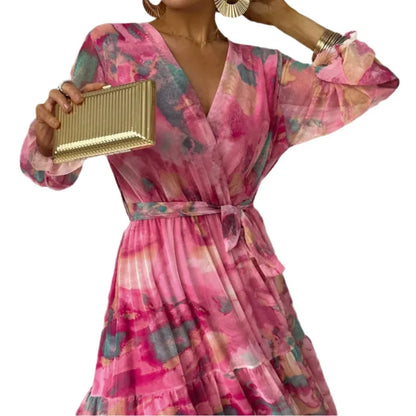 Damklänning – Maxilängd – V-ringning – Bälte i midjan – Lång ärm – Volangkjol